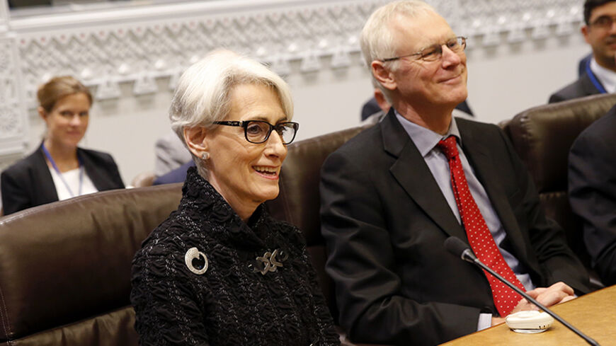 U.S. Under-Secretary of State Wendy Sherman sits with British Political Director Simon Gass at the outset of the political directors meeting of the EU/E3+3 to discuss the Iranian nuclear issue at United Nations Headquarters in New York, September 19, 2014. REUTERS/Mike Segar (UNITED STATES - Tags: POLITICS) - RTR46XWD