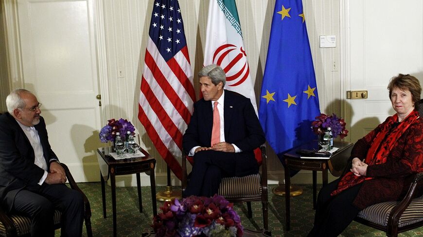 U.S. Secretary of State John Kerry (C), European Union (EU) High Representative for Foreign Affairs Catherine Ashton (R) and Iranian Foreign Minister Mohammad Javad Zarif participate in a trilateral meeting at the Waldorf Astoria hotel in New York September 25, 2014. REUTERS/Eduardo Munoz (UNITED STATES - Tags: POLITICS) - RTR47QH4