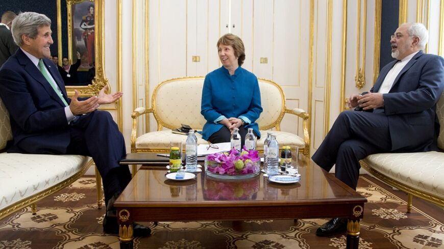 (L-R) U.S. Secretary of State John Kerry, European Union Foreign Policy Chief Catherine Ashton, and Iran's Foreign Minister Mohammad Javad Zarif are photographed as they participate in a trilateral meeting in Vienna October 15, 2014.    REUTERS/Carolyn Kaster/Pool (AUSTRIA - Tags: POLITICS) - RTR4A9TG