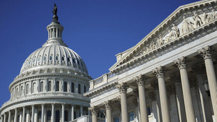 The U.S. Capitol dome and U.S. Senate (R) in Washington, August 2, 2011. The United States is poised to step back from the brink of economic disaster on Tuesday when a bitterly fought deal to cut the budget deficit is expected to clear its final hurdles in the U.S. Senate. REUTERS/Jonathan Ernst (UNITED STATES - Tags: POLITICS BUSINESS) - RTR2PJWO