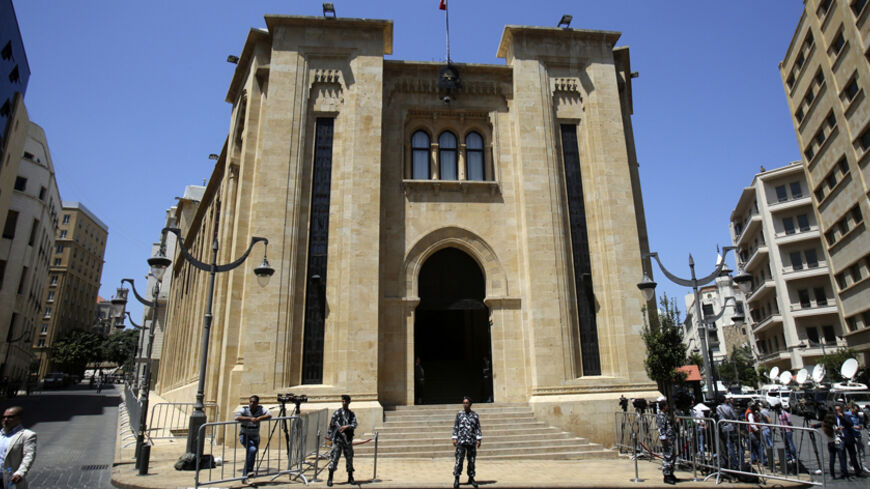 Lebanese policemen secure the area outside the parliament during the first ballot for a new president in downtown Beirut April 23, 2014. Parliament has been summoned to choose a successor to President Michel Suleiman, whose six-year term ends in late May, but deep divisions over the war in neighbouring Syria could delay any decision, possibly for several months. REUTERS/Sharif Karim (LEBANON - Tags: POLITICS ELECTIONS) - RTR3MAA1
