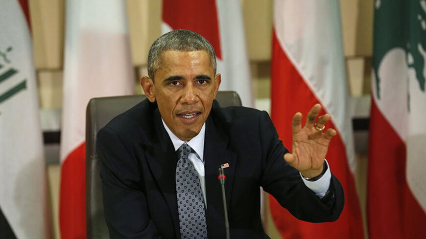 U.S. President Barack Obama speaks at a meeting with more than 20 foreign defense chiefs to discuss the coalition efforts in the ongoing campaign against ISIL at Joint Base Andrews in Washington October 14, 2014. Some three weeks before U.S. congressional elections viewed largely as a referendum on Obama's leadership, the president will aim to show the U.S. public and allies abroad that he is committed to a plan to "degrade" and "destroy" the group that has taken over large swaths of Iraq and Syria.
REUT