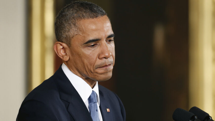 U.S. President Barack Obama answers questions at a news conference in the East Room of the White House in Washington, November 5, 2014. The president addressed reporters one day after after Republicans seized control of the U.S. Senate and captured their biggest majority in the House of Representatives in more than 60 years.          REUTERS/Kevin Lamarque (UNITED STATES  - Tags: POLITICS ELECTIONS)   - RTR4CZV6