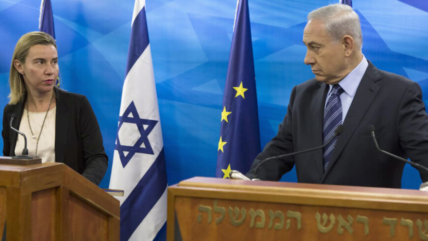 European Union foreign policy chief Federica Mogherini (L) attends a media conference with Israeli Prime Minister Benjamin Netanyahu in Jerusalem November 7, 2014. REUTERS/Jim Hollander/Pool (ISRAEL - Tags: POLITICS CIVIL UNREST TPX IMAGES OF THE DAY) - RTR4D9OH