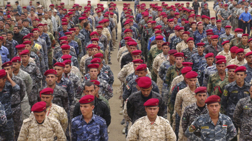 Sunni tribesmen take part in a military training, as they prepare to fight against militants of the Islamic State, on the outskirt of Ramadi, west of Baghdad, November 16, 2014. Islamic State's systematic massacre of hundreds of Iraq's Albu Nimr tribe should have been an unmistakable wake up call for a country that may not be able to stabilise without long-term support from Sunni tribesmen. Picture taken November 16, 2014. REUTERS/Ali al-Mashhadani (IRAQ - Tags: CONFLICT MILITARY POLITICS) - RTR4EH9R