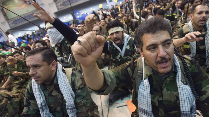 EDITORS' NOTE: Reuters and other foreign media are subject to Iranian restrictions on leaving the office to report, film or take pictures in Tehran.

Members of Iran's Islamic Basij militia shout anti-U.S. and anti-Israel slogans during a ceremony to mark Basij week in Tehran November 26, 2009. REUTERS/Morteza Nikoubazl (IRAN MILITARY POLITICS) - RTXR603