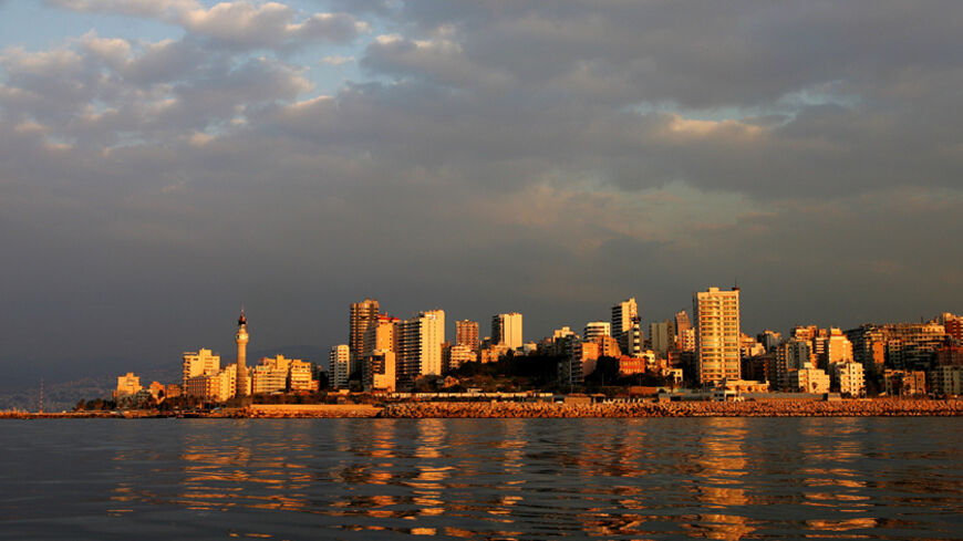 The sun sets in the Lebanese capital of Beirut 02 February 2007. The UN climate panel today blamed humans for global warming and warned it would be unstoppable for centuries to come, causing rising seas and fierce storms. The report by the Intergovernmental Panel on Climate Change (IPCC) -- the world's paramount scientific authority on global warming -- said the phenomenon was "very likely" caused by human activity, with a certitude of 90 percent.                    AFP PHOTO/MARWAN NAAMANI        (Photo cr