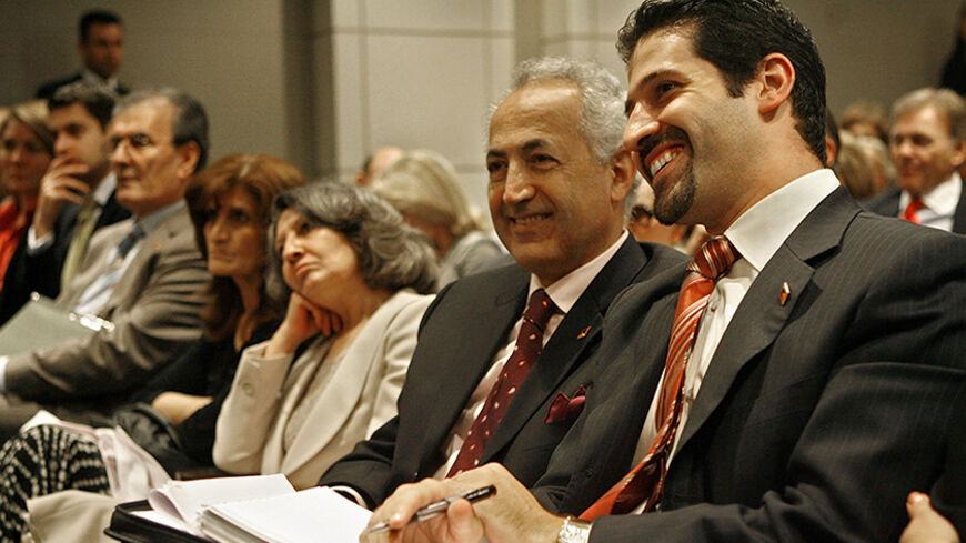 WASHINGTON - SEPTEMBER 26:  Qubad Talabani, Kurdish representative to the U.S. and son of Iraq President Jalal Talibani (R), and Iraq Ambassador to the U.S. Samir Sumaidaie (2nd R) listen as President Talabani delivers an address and answers questions at the Woodrow Wilson Centet for International Scholars September 26, 2006 in Washington, DC.   Talabani told the Washington Post newspaper that he wants to see a presence of 10,000 American troops and two American air bases in Iraq "long term."  (Photo by Chi