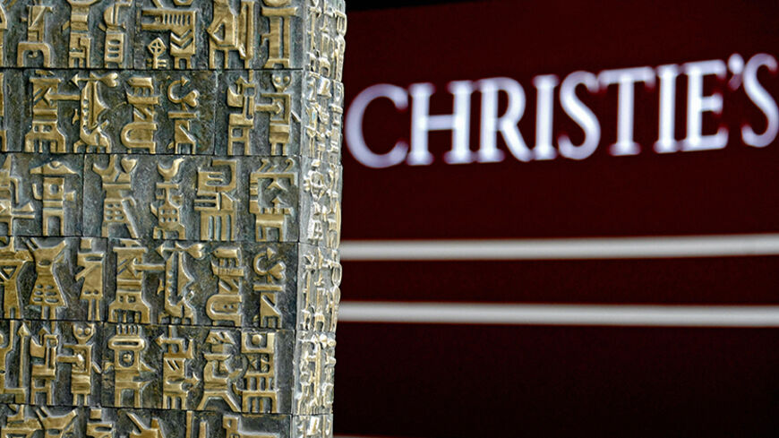 "The Wall" sculpture by Iranian Parviz Tanavoli is exhibited in Dubai, on April 27, 2008, prior to being auctioned at Christies Middle East next week. The estimated price of the sculpture painting is between $400,000-$600,000 (1,500,000-2,200,000UAE Dirhams). Christie's organisers said that the spring sales is set to offer more than $30,000,000 worth of art, jewellery and watches to Middle East market.   AFP PHOTO/MARWAN NAAMANI (Photo credit should read MARWAN NAAMANI/AFP/Getty Images)