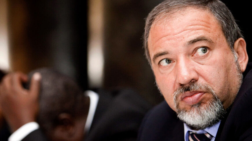 Israel's Foreign Minister Avigdor Liberman attends a meeting with the business community in Uganda's capital Kampala, September 10, 2009. Lieberman, accompanied by business and military delegation, is on an official African visit to Ethiopia, Kenya, Ghana, Uganda, and Nigeria. REUTERS/James Akena (UGANDA POLITICS BUSINESS) - RTR27O1U