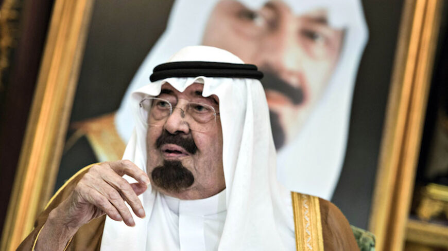 Saudi King Abdullah bin Abdul Aziz al-Saud sits before a meeting with U.S. Secretary of State John Kerry at the Royal Palace in Jeddah September 11, 2014. The United States signed up Arab allies on Thursday to a "coordinated military campaign" against Islamic State fighters, a major step in building regional support for President Barack Obama's plan to strike both sides of the Syrian-Iraqi frontier. After talks in Saudi Arabia's summer capital Jeddah, Kerry won backing from 10 Arab countries - Egypt, Iraq, 