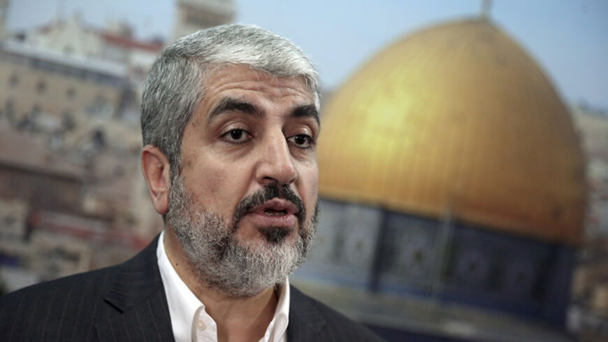 Hamas leader Khaled Meshaal speaks during an interview with Reuters in Doha October 16, 2014. Meshaal on Thursday called on Muslims to defend the al-Aqsa mosque compound in Jerusalem, saying Israel was trying to seize the site, revered in Islam and Judaism and focus of a Palestinian uprising in 2000.      REUTERS/Fadi Al-Assaad (QATAR - Tags: POLITICS RELIGION) - RTR4AH1S