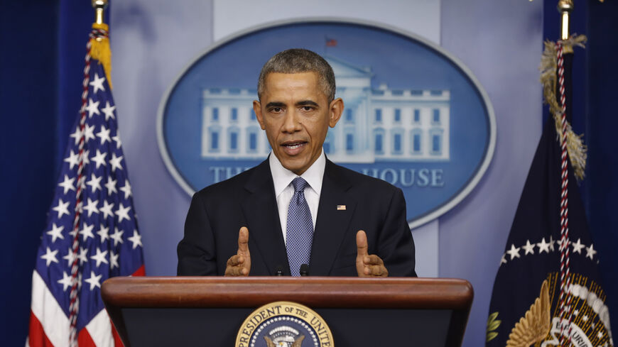 U.S. President Barack Obama answers questions after his end of the year press conference in the briefing room of the White House in Washington, December 19, 2014. Obama and his family plan to depart Washington later in the day to spend the holidays in Hawaii. REUTERS/Larry Downing (UNITED STATES - Tags: POLITICS) - RTR4IQKI