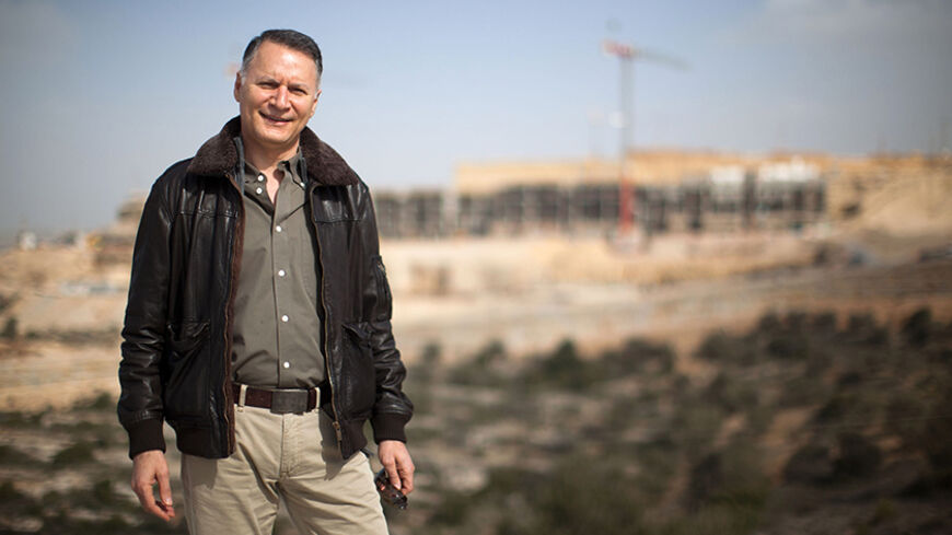 RAWABI, WEST BANK - FEBRUARY 08: Bashar Masri, the Palestinian-American developer of Rawabi, visits the site on February 8, 2012 in Rawabi, West Bank. The planned Palestinian city, with the first stage expected to be finished in two years, will have six neighborhoods and a population of 40,000. (Photo by Uriel Sinai/Getty Images)