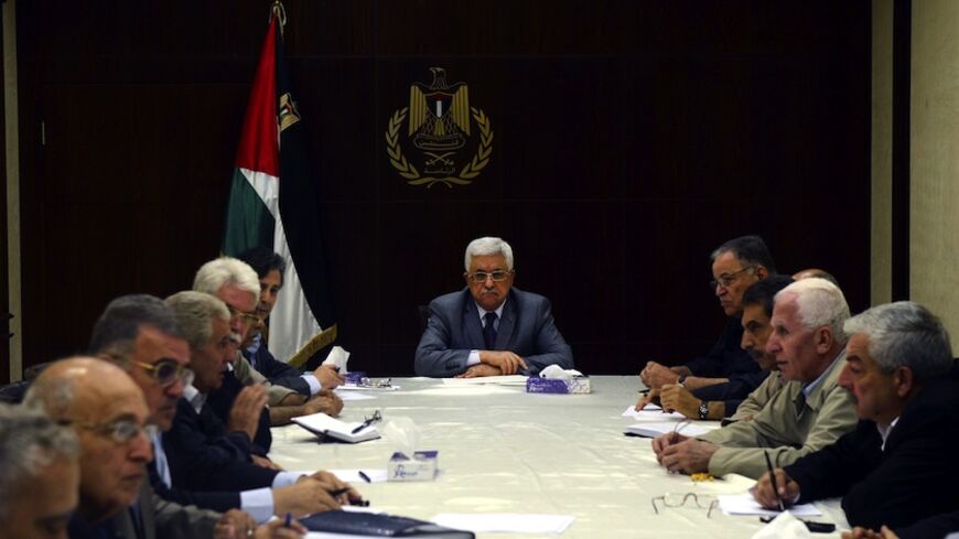 RAMALLAH, WEST BANK - JULY 13: In this handout photo provided by the Palestinian Press Office (PPO), Palestinian President Mahmoud Abbas (C) meets with the Central Committee of the Fatah movement July 13, 2014 in Ramallah, West Bank. The total number of Palestinians killed by Israeli airstrikes on the Gaza Strip since Monday has reached 166, according to a Palestinian Health Ministry official. (Photo by Thaer Ghanaim/PPO via Getty Images)