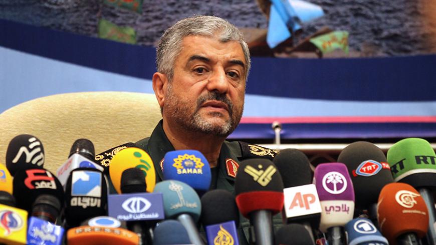 Iranian Revolutionary Guards commander Brigadier General Mohammad Ali Jafari holds a press conference in Tehran on September 16, 2012. Jafari said members of his elite special operations unit, the Quds Force, are present in Syria and Lebanon but only to provide "counsel." AFP PHOTO/ATTA KENARE        (Photo credit should read ATTA KENARE/AFP/GettyImages)