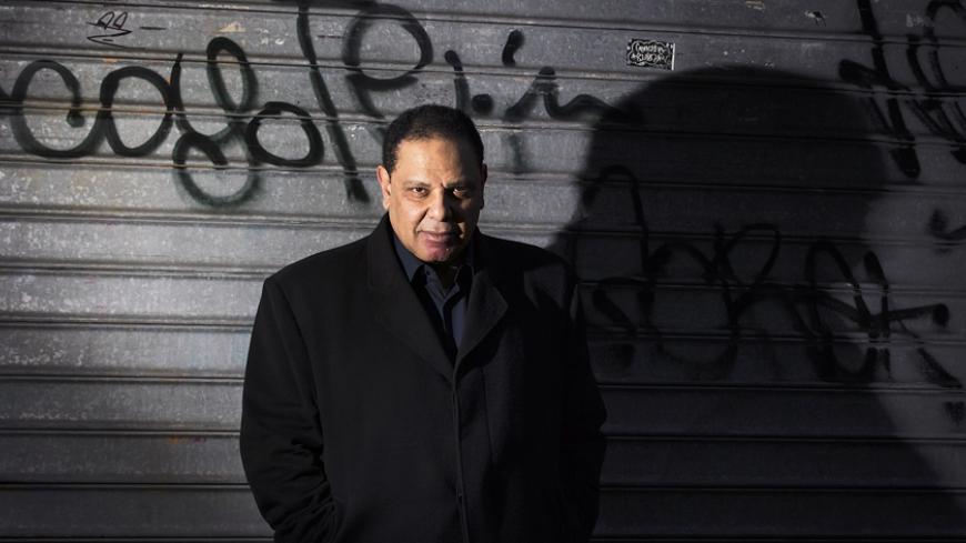Egyptian novelist Alaa al-Aswany poses on February 12, 2014 in Paris. AFP PHOTO / JOEL SAGET        (Photo credit should read JOEL SAGET/AFP/Getty Images)