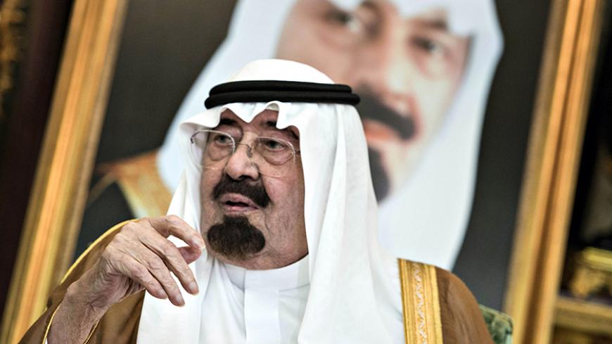 Saudi King Abdullah bin Abdul Aziz al-Saud sits before a meeting with U.S. Secretary of State John Kerry at the Royal Palace in Jeddah September 11, 2014. The United States signed up Arab allies on Thursday to a "coordinated military campaign" against Islamic State fighters, a major step in building regional support for President Barack Obama's plan to strike both sides of the Syrian-Iraqi frontier. After talks in Saudi Arabia's summer capital Jeddah, Kerry won backing from 10 Arab countries - Egypt, Iraq, 