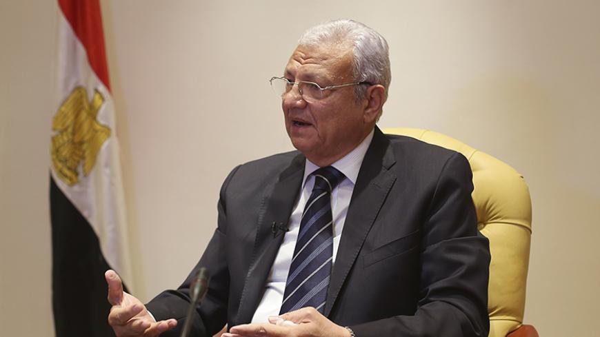 Egypt's Communications and Information Technology Minister Atef Helmy speaks during an interview with Reuters at the Smart Village on the outskirts of Cairo October 20, 2014. Egypt is seeking billions of dollars in investment to upgrade its telecommunications infrastructure as part of efforts to attract multinationals and restore growth after three years of political upheaval, telecoms minister Helmy said. He said said Egypt needs investment of $5-$6 billion to build broadband internet across the nation and