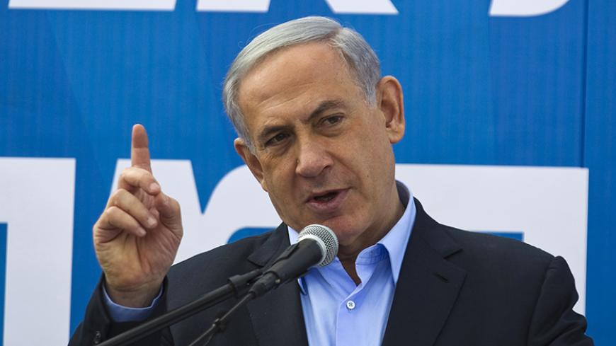 Israel's Prime Minister Benjamin Netanyahu speaks during a cornerstone laying ceremony for a new neighbourhood in the southern town of Sderot January 28, 2015. REUTERS/Amir Cohen (ISRAEL - Tags: POLITICS) - RTR4NAB3