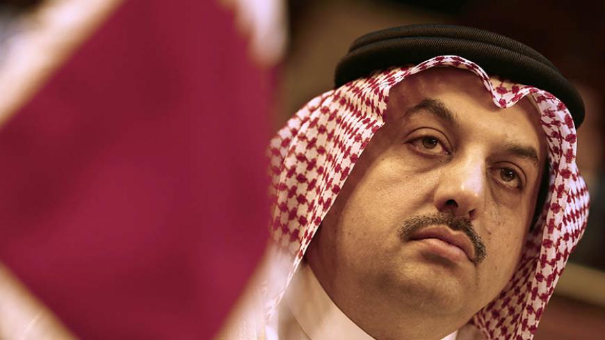 Qatar's Foreign Minister Khalid bin Mohammed Al Attiyah attends an extraordinary session of the Arab League at the league's headquarters in Cairo July 14, 2014. Egypt launched an initiative on Monday to halt fighting between Israel and Palestinian militants, proposing a ceasefire to be followed by talks in Cairo on settling the conflict in which Gaza authorities say more than 170 people have died. REUTERS/Amr Abdallah Dalsh (EGYPT - Tags: POLITICS CIVIL UNREST) - RTR3YNOY