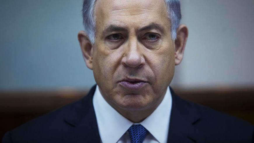 Israel's Prime Minister Benjamin Netanyahu attends the weekly cabinet meeting at his office in Jerusalem February 15, 2015. Netanyahu, who is due to address the U.S. Congress on Iran on March 3 - to the annoyance of the Obama administration - has vowed "to foil this bad and dangerous agreement." REUTERS/Abir Sultan/Pool (JERUSALEM - Tags: POLITICS) - RTR4PN1Y