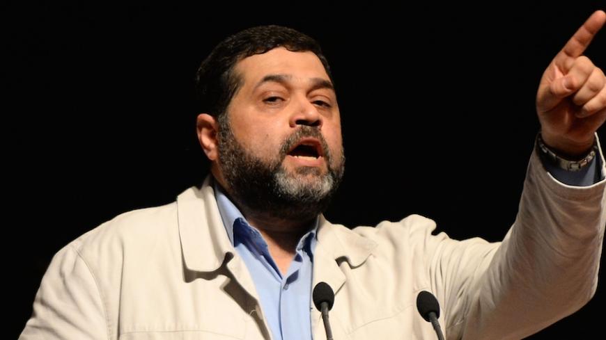 Palestinian Islamic movement Hamas' leader, Osama Hamdan gives a speech during the fifth annual meeting of the Moroccan movement for Unification and Reform (known as Attawhid Wal'Islah in Arabic and MUR in French) on August 9, 2014 at the Mohammed V theatre in the capital Rabat. The meeting, with this year's theme being "Reforms, cooperation and responsability", gathers political local and foreign representatives, coming notably from Sudan, Tunisia, Algeria and also from Europe.  AFP PHOTO / FADEL SENNA    