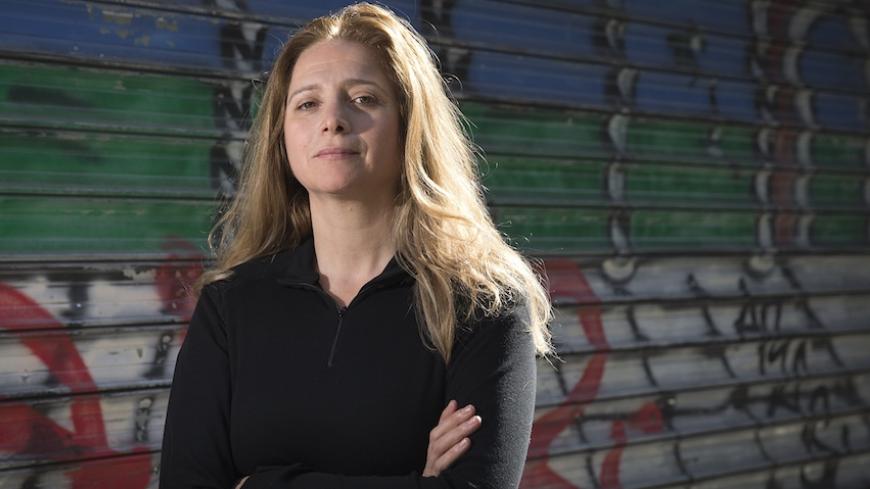 Syrian writer and journalist Samar Yazbek poses on September 26, 2014 in Paris. AFP PHOTO JOEL SAGET        (Photo credit should read JOEL SAGET/AFP/Getty Images)