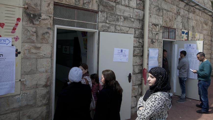 ABU GUSH, ISRAEL - MARCH 17: Arab Israeli women stand outside a polling station on election day on March 17, 2015 in Abu Gush, Israel. Israel's general election voting has begun today as polls show on that Chairman of the Zionist Union party, Isaac Herzog stands as the only rival to current Prime Minister Benjamin Netanyahu. (Photo by Lior Mizrahi/Getty Images)