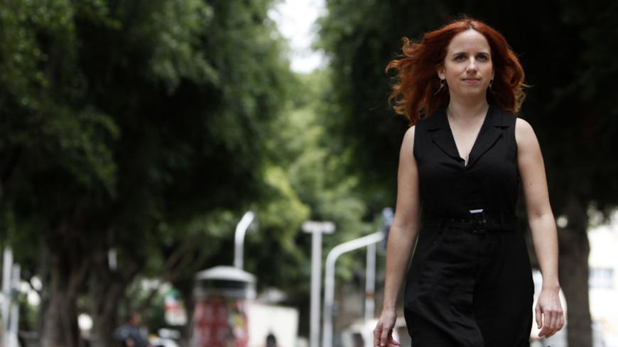 Labour party candidate Stav Shaffir poses on Rothschild Avenue in Tel Aviv, the site of a 2011 protest against high housing costs, December 5, 2012. The leaders of a grassroots social protest movement that swept Israel in 2011, one of them Shaffir, have shot to the top of a rejuvenated Labour party that polls say will at least double its power in a Jan. 22 general election that Prime Minister Benjamin Netanyahu's right-wing Likud is forecast to win. Picture taken December 5, 2012. REUTERS/Amir Cohen (ISRAE