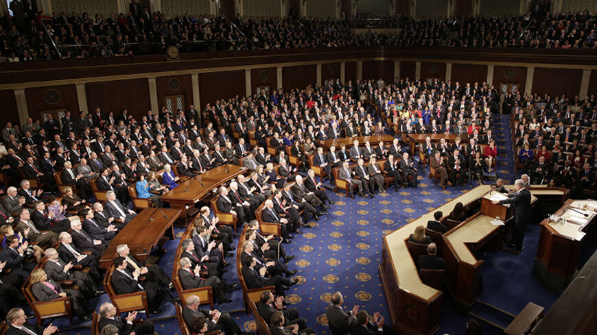 Israeli Prime Minister Benjamin Netanyahu (R) addresses a joint meeting of Congress in the House Chamber on Capitol Hill in Washington, March 3, 2015. REUTERS/Joshua Roberts (UNITED STATES - Tags: POLITICS) - RTR4RWM9