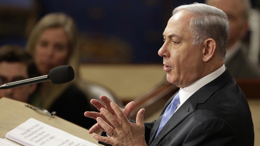 Israeli Prime Minister Benjamin Netanyahu addresses a joint meeting of the U.S. Congress at the Capitol in Washington March 3, 2015.          REUTERS/Joshua Roberts (UNITED STATES  - Tags: POLITICS)   - RTR4RX0B