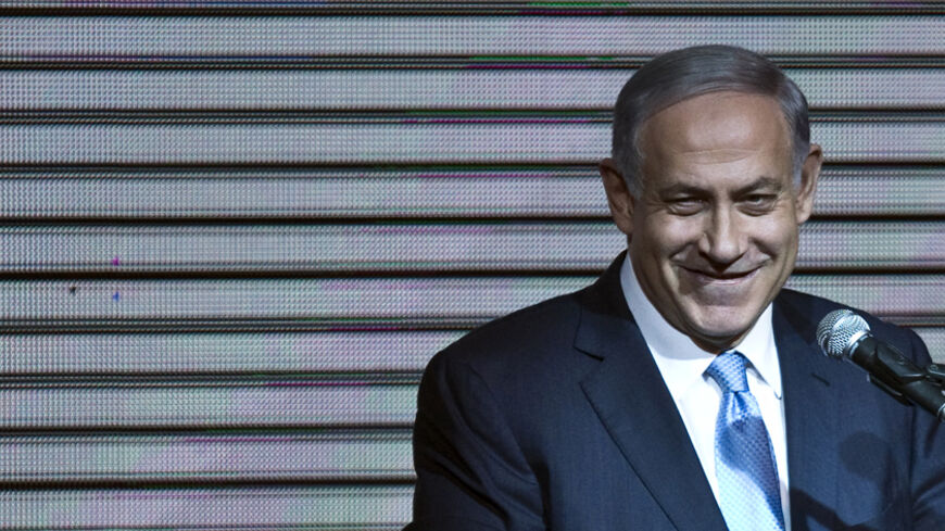 Israeli Prime Minister Benjamin Netanyahu delivers a speech to supporters at party headquarters in Tel Aviv March 18, 2015. Netanyahu claimed victory in Israel's election on Tuesday after exit polls showed he had erased his center-left rivals' lead with a hard rightward shift that saw him disavow a commitment to negotiate a Palestinian state. REUTERS/Nir Elias (ISRAEL - Tags: POLITICS ELECTIONS TPX IMAGES OF THE DAY) - RTR4TROG