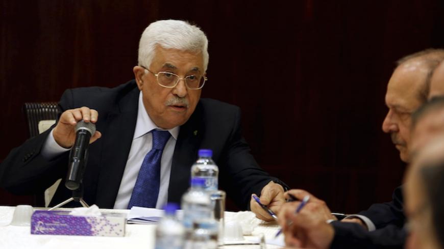 Palestinian President Mahmoud Abbas attends a Palestinian Liberation Organization (PLO) executive committee meeting in the West Bank city of Ramallah March 19, 2015. REUTERS/Mohamad Torokman - RTR4U0K8