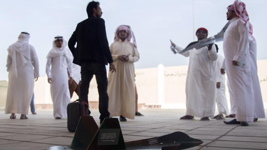 Saudi students prepare to fly a home-made replica of a jet fighter on April 8, 2015 in Tabuk. The plane was nicknamed "Decisive plane" as a sign of support to Saudi-led coalitions Operation Decisive Storm against the Huthi rebels in Yemen. AFP PHOTO / MOHAMMED ALBUHAISI
(Photo credit should read MOHAMMED ALBUHAISI/AFP/Getty Images)