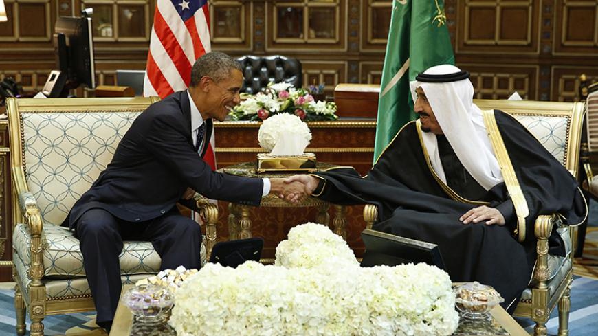 U.S. President Barack Obama (L) shakes hands with Saudi Arabia's King Salman at the start of a bilateral meeting at Erga Palace in Riyadh January 27, 2015. Obama sought to cement ties with Saudi Arabia as he came to pay his respects on Tuesday after the death of King Abdullah, a trip that underscores the importance of a U.S.-Saudi alliance that extends beyond oil interests to regional security. REUTERS/Jim Bourg (SAUDI ARABIA - Tags: POLITICS TPX IMAGES OF THE DAY) - RTR4N5LG