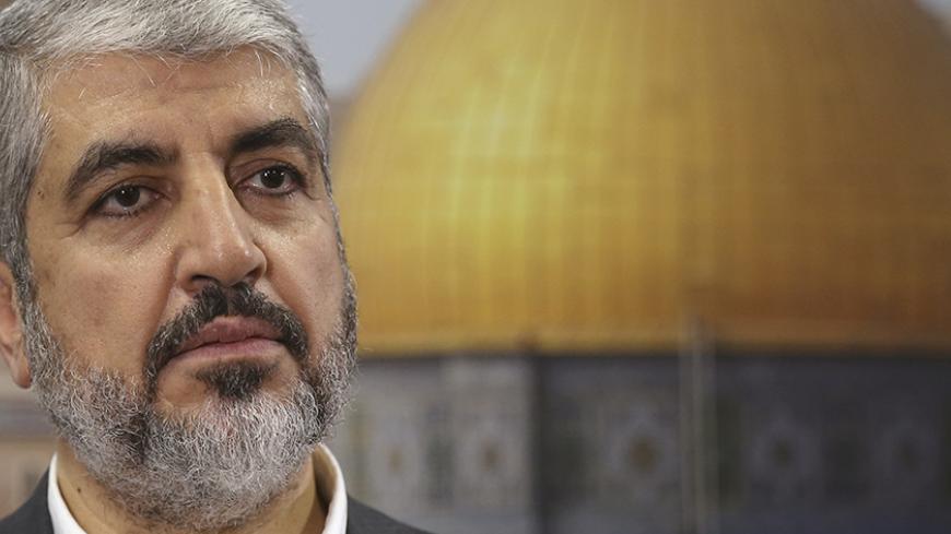 Hamas leader Khaled Meshaal speaks during an interview with Reuters in Doha October 16, 2014. Meshaal on Thursday called on Muslims to defend the al-Aqsa mosque compound in Jerusalem, saying Israel was trying to seize the site, revered in Islam and Judaism and focus of a Palestinian uprising in 2000. REUTERS/Fadi Al-Assaad (QATAR - Tags: POLITICS RELIGION) - RTR4AH1B