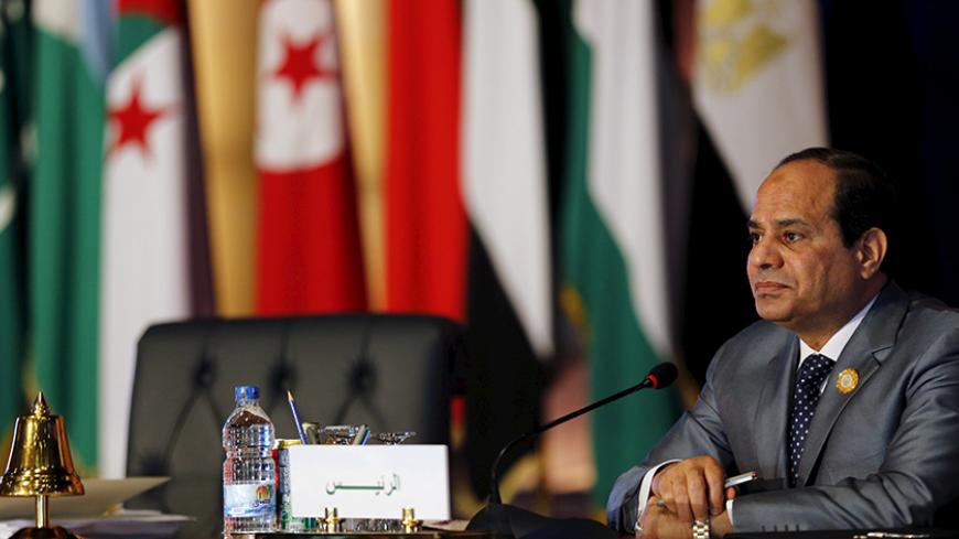 Egyptian President Abdel Fattah al-Sisi attends during the closing session of the Arab Summit in Sharm el-Sheikh, in the South Sinai governorate, south of Cairo, March 29, 2015. Arab leaders at a summit in Egypt will announce the formation of a unified regional force to counter growing security threats, according to a draft of the final communique, as conflicts rage from Yemen to Libya. REUTERS/Amr Abdallah Dalsh  - RTR4VBXG