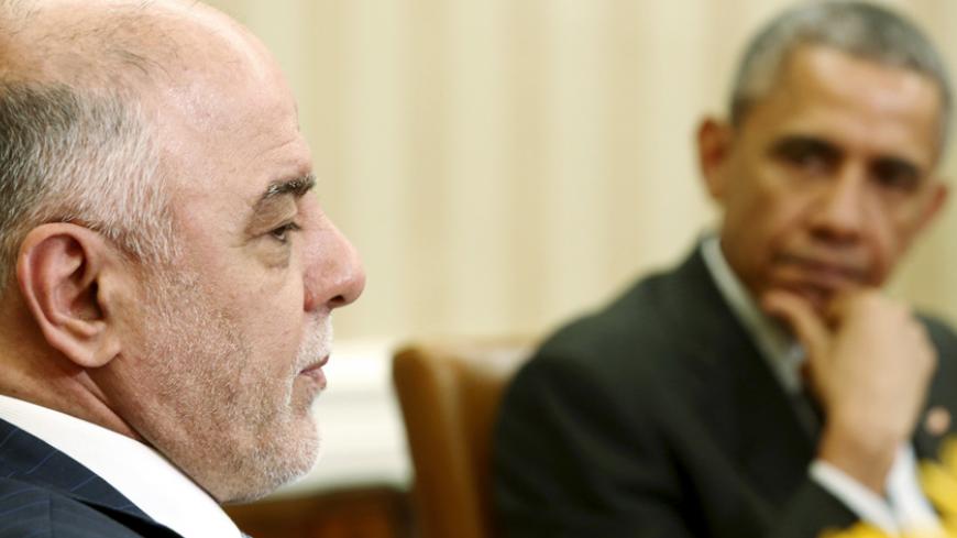 Iraq's Prime Minister Haider Al-Abadi (L) and U.S. President Barack Obama deliver remarks to reporters after their bilateral meeting in the Oval Office at the White House in Washington April 14, 2015.  REUTERS/Jonathan Ernst - RTR4XBNF
