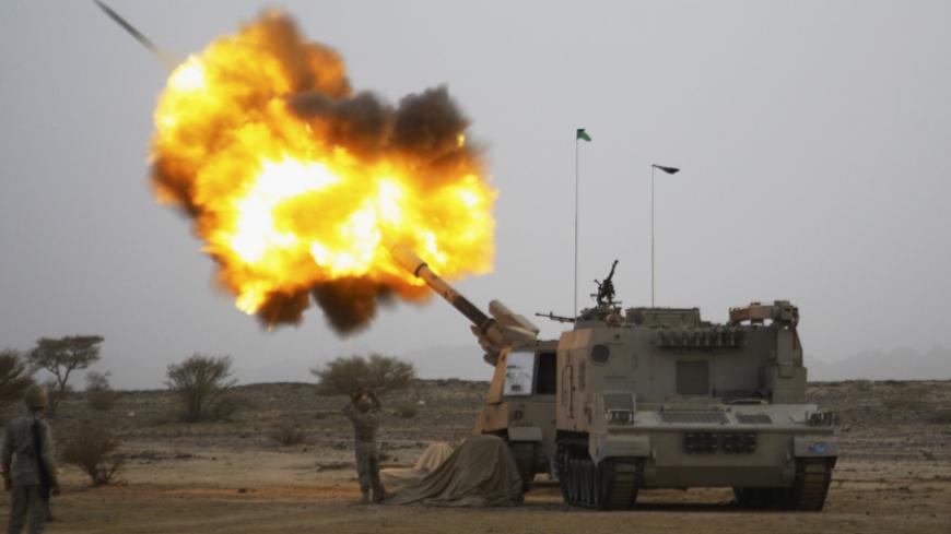 Saudi army artillery fire shells towards Houthi movement positions at the Saudi border with Yemen April 15, 2015. REUTERS/Stringer TPX IMAGES OF THE DAY      - RTR4XHTX