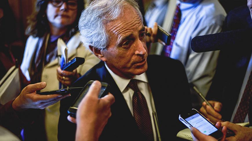 U.S. Senator Bob Corker (R-TN) speaks to reports at the U.S. Capitol in Washington April 21, 2015. REUTERS/James Lawler Duggan - RTX19PE3