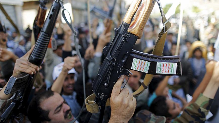 Followers of the Houthi group demonstrate against the Saudi-led air strikes in Sanaa April 22, 2015. REUTERS/Khaled Abdullah - RTX19UBJ