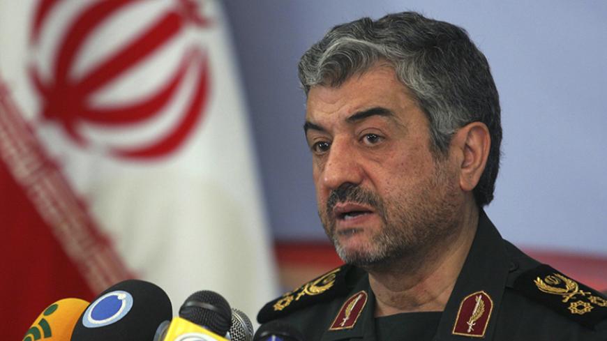 EDITORS' NOTE: Reuters and other foreign media are subject to Iranian restrictions on their ability to film or take pictures in Tehran.

Mohammad Ali Jafari, commander of the Islamic Revolutionary Guard Corp, attends a news conference in Tehran February 7, 2011. REUTERS/STRINGER (IRAN - Tags: POLITICS MILITARY) - RTXXKFA