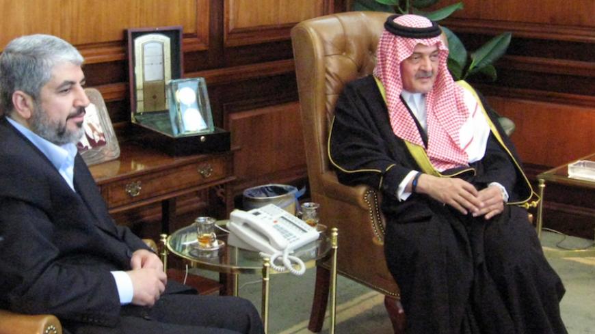 Hamas's exiled leader Khaled Meshaal (L) holds a joint press conference with Saudi Foreign Minister Prince Saud al-Faisal following a meeting in Riyadh on Januray 3, 2010. Meshaal said that the Egyptian-led talks aimed at reconciling the Palestinian Islamist movement and its rival Fatah were close to bearing fruit. AFP PHOTO/PAUL HANDLEY (Photo credit should read PAUL HANDLEY/AFP/Getty Images)