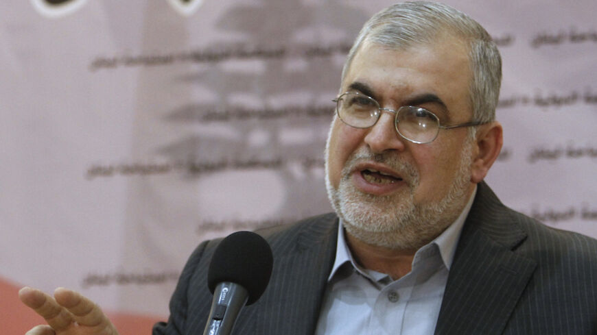 The head of Lebanon's Hezbollah parliamentary bloc Mohamed Raad speaks during a news conference in Beirut March 4, 2011. Raad spoke out against the Special Tribunal for Lebanon (STL), which was established in 2007 to prosecute, under Lebanese law, criminal acts relating to the 2005 assassination of former Lebanese Prime Minister Rafik al-Hariri in Lebanon. REUTERS/Jamal Saidi    (LEBANON) - RTR2JFBJ