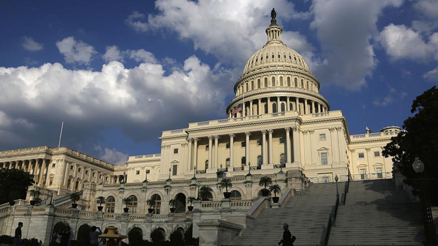 A general view of the U.S. Capitol Dome in Washington October 6, 2013. Republican House Speaker John Boehner vowed on Sunday not to raise the U.S. debt ceiling without a "serious conversation" about what is driving the debt, while Democrats said it was irresponsible and reckless to raise the possibility of a U.S. default.   REUTERS/Jonathan Ernst    (UNITED STATES - Tags: POLITICS BUSINESS) - RTR3FOB9
