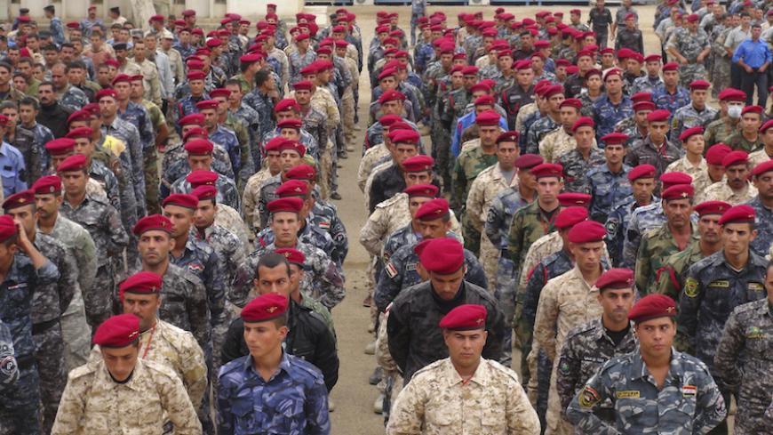 Sunni tribesmen take part in a military training, as they prepare to fight against militants of the Islamic State, on the outskirt of Ramadi, west of Baghdad, November 16, 2014. Islamic State's systematic massacre of hundreds of Iraq's Albu Nimr tribe should have been an unmistakable wake up call for a country that may not be able to stabilise without long-term support from Sunni tribesmen. Picture taken November 16, 2014.   REUTERS/Ali al-Mashhadani (IRAQ - Tags: CONFLICT MILITARY POLITICS) - RTR4EH9R