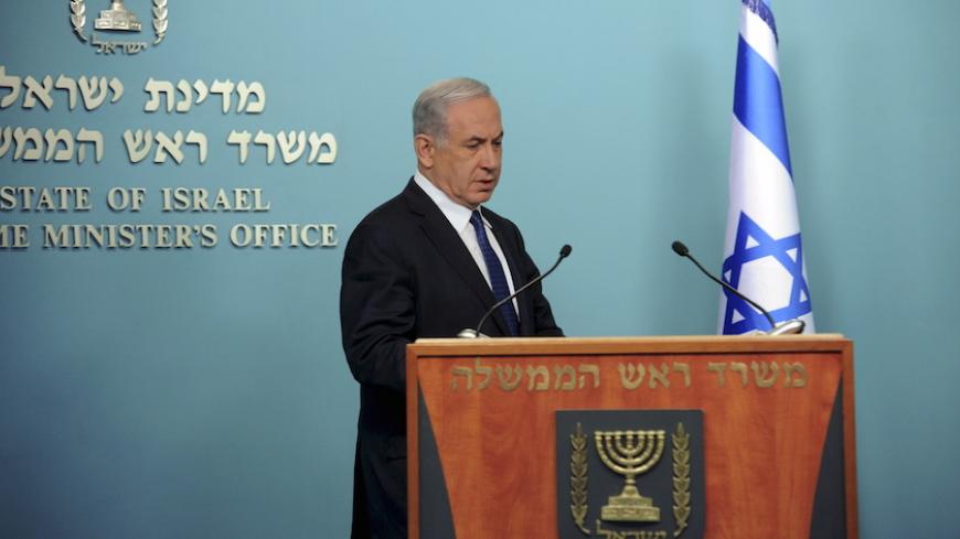 Israeli Prime Minister Benjamin Netanyahu arrives to deliver a statement to the media in Jerusalem April 1, 2015. Netanyahu said on Wednesday it was not too late for world powers still locked in nuclear negotiations with Iran to demand a "better deal". REUTERS/Debbie Hill/Pool - RTR4VQNP