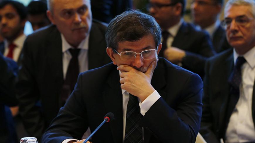 Turkey's Foreign Minister Ahmet Davutoglu attends the opening of the Geneva-2 peace conference in Montreux January 22, 2014. Syria's government and opposition, meeting face to face for the first time at a U.N. peace conference, angrily spelled out their hostility on Wednesday as world powers also restated contrasting views on the future of President Bashar al-Assad.  REUTERS/ Jamal Saidi   (SWITZERLAND - Tags: POLITICS) - RTX17PGV