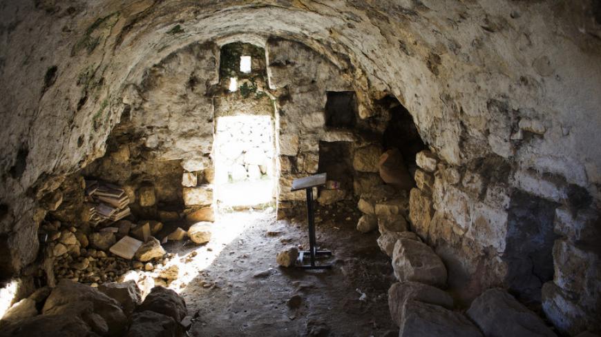 A room, which is part of an archaeological site, is seen in the Jewish settler neighbourhood of Tel Rumeida, in the divided city of Hebron in the occupied West Bank January 19, 2014. The Jewish settlers use such sites to deepen their claims on Biblical cities, while Palestinians see the move as a means to grab land they want for a future state and an attempt to scrub out their own historical ties. Picture taken January 19, 2014. To match Feature ISRAEL-PALESTINIANS/ARCHAEOLOGY REUTERS/Ronen Zvulun (WEST